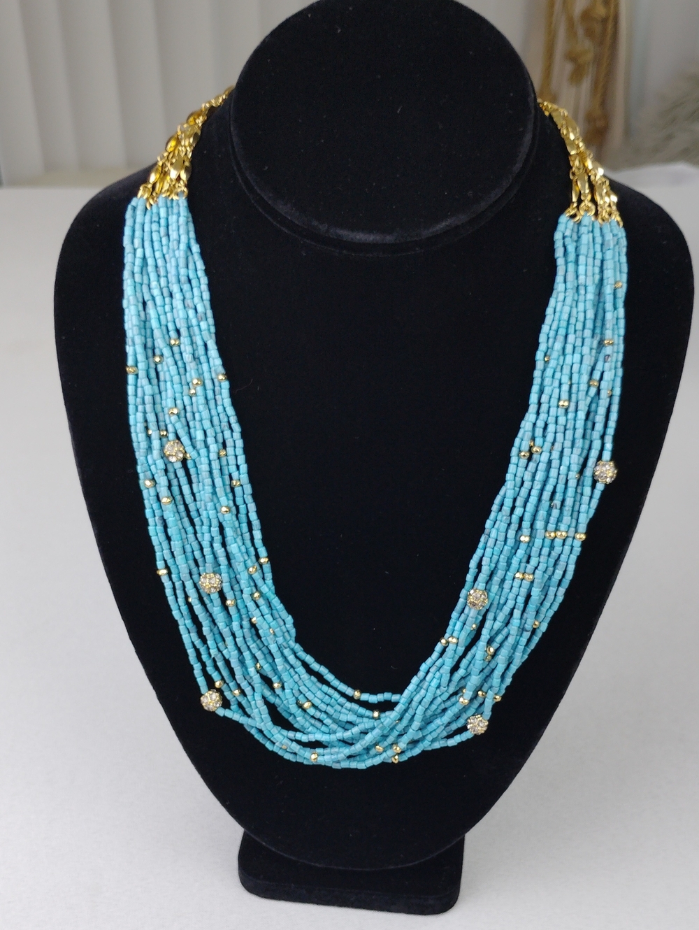 Multi-Strand Beaded Necklace.